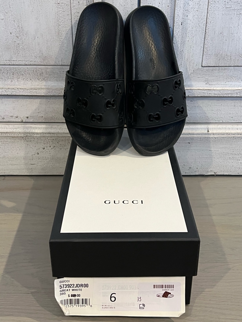 Gucci Black Embossed GG Rubber Slide Sandals